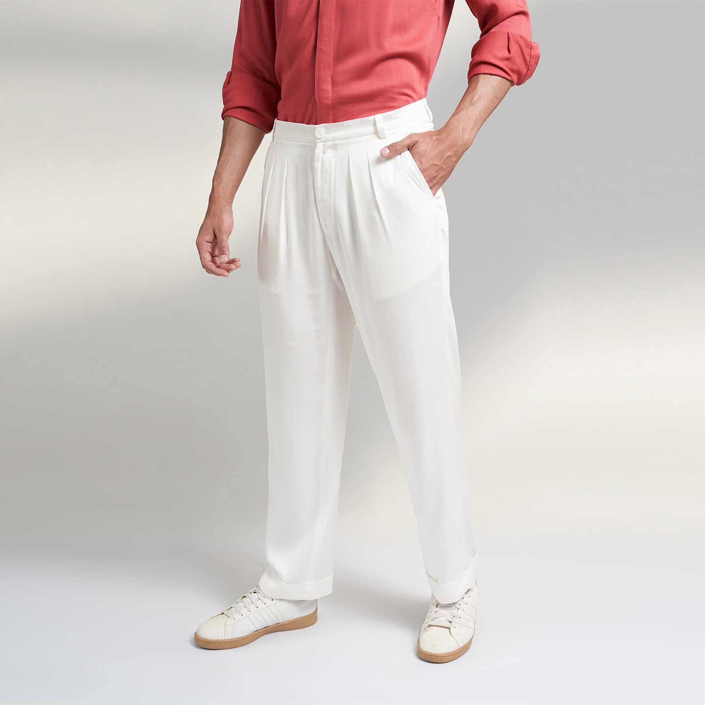 A COMFORT fit trousers in organic lotus stem fabric with 2 front pleats and turn up bottom and one back pocket details. the Trouser is super soft and comfortable to wear.