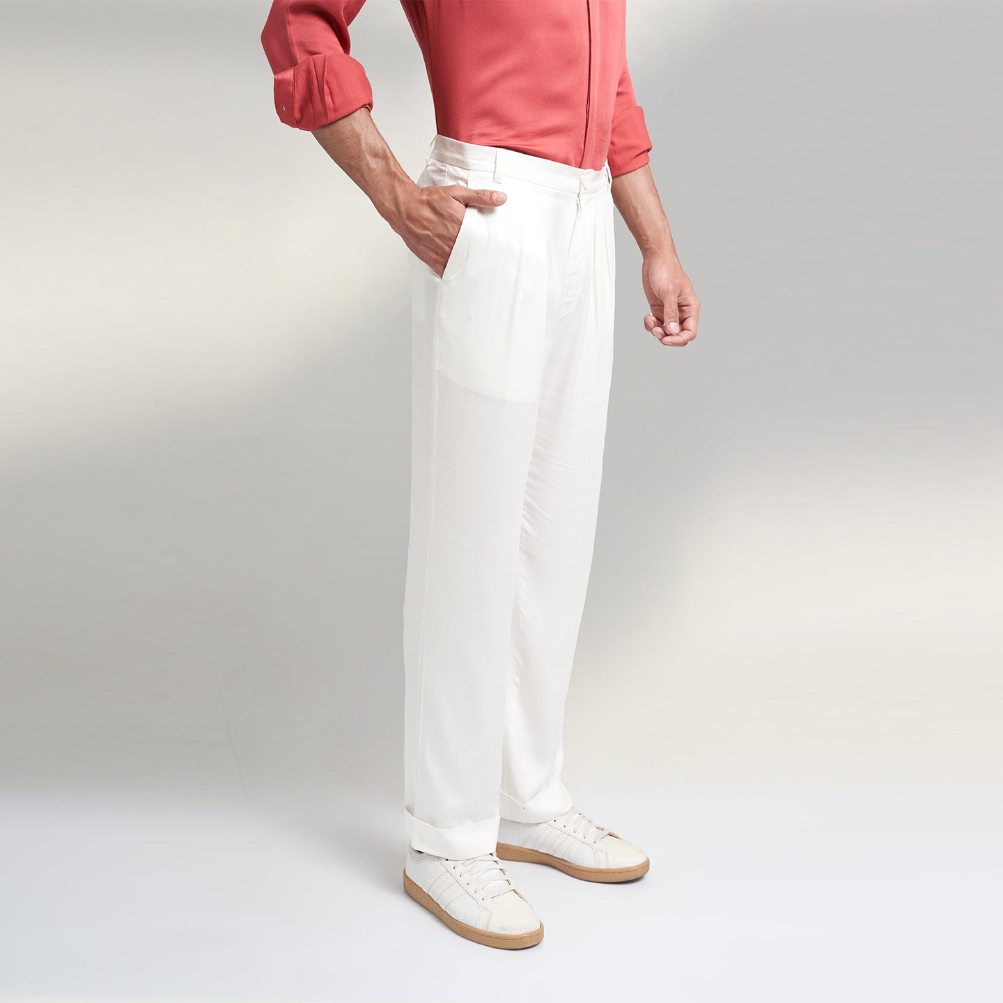 A COMFORT fit trousers in organic lotus stem fabric with 2 front pleats and turn up bottom and one back pocket details. the Trouser is super soft and comfortable to wear.